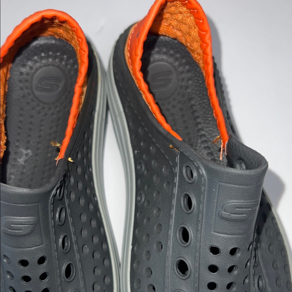 Skechers Kids Black and Orange Slip-On Sneakers - Picture 9 of 10